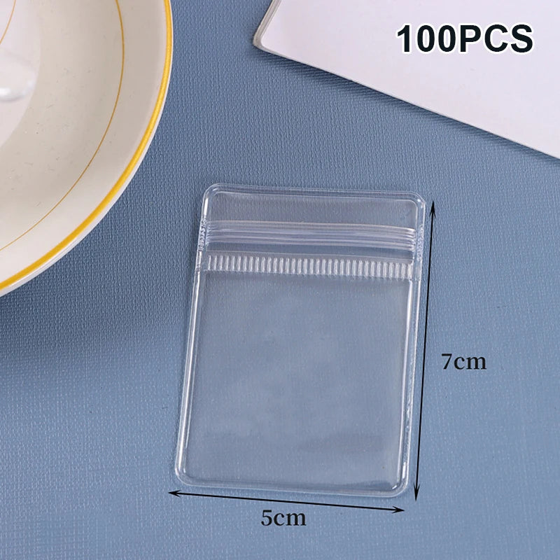 (ZYDD01) 100pcs Jewelry Organizer Pouch Bags Mini Transparent PVC Anti-Oxidation Earring Pendant Necklace Bracelet Storage Bags - CarrieOnExpress