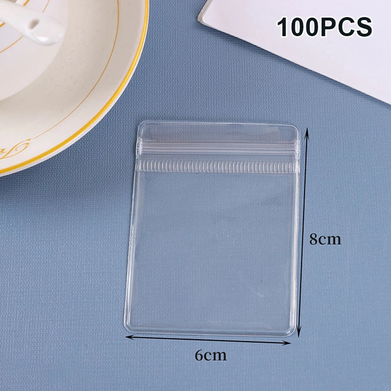 (ZYDD01) 100pcs Jewelry Organizer Pouch Bags Mini Transparent PVC Anti-Oxidation Earring Pendant Necklace Bracelet Storage Bags - CarrieOnExpress