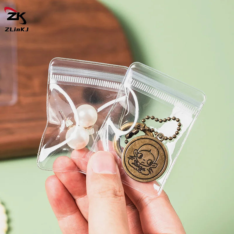 (ZYDD01) 100pcs Jewelry Organizer Pouch Bags Mini Transparent PVC Anti-Oxidation Earring Pendant Necklace Bracelet Storage Bags - CarrieOnExpress
